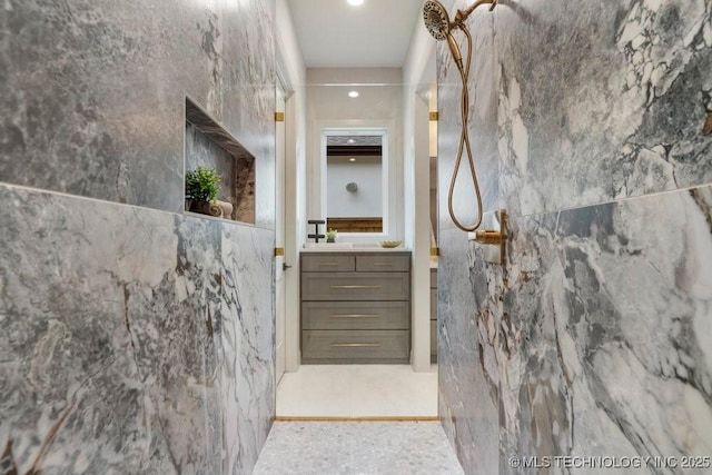 12030 S Vandalia Ave, Tulsa, OK 74137 - hallway with tile walls and recessed lighting