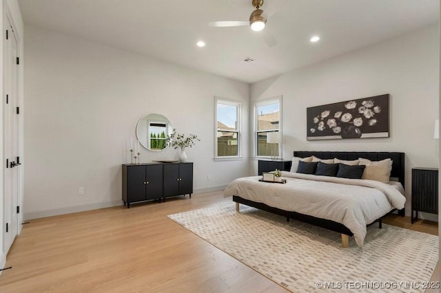 12030 S Vandalia Ave, Tulsa, OK 74137 - bedroom with light wood finished floors, recessed lighting, and ceiling fan