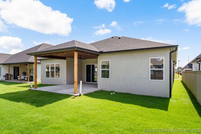 12030 S Vandalia Ave, Tulsa, OK 74137 - back of house with a ceiling fan, a patio, and stucco siding