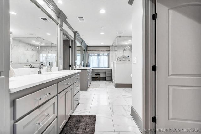 bathroom with marble finish floor, visible vents, vanity, and a marble finish shower