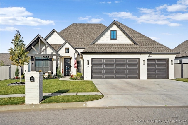 view of front of house featuring roof with shingles, a front yard, fence, a garage, and driveway