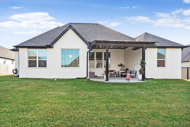 rear view of property with a shingled roof, a patio, fence, a pergola, and brick siding