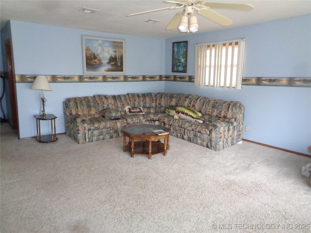 carpeted living area with ceiling fan, visible vents, and baseboards