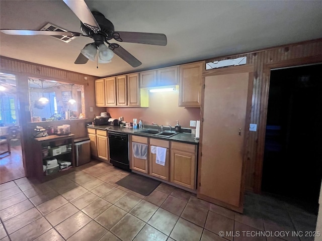 kitchen with light tile patterned floors, a sink, a ceiling fan, dishwasher, and dark countertops