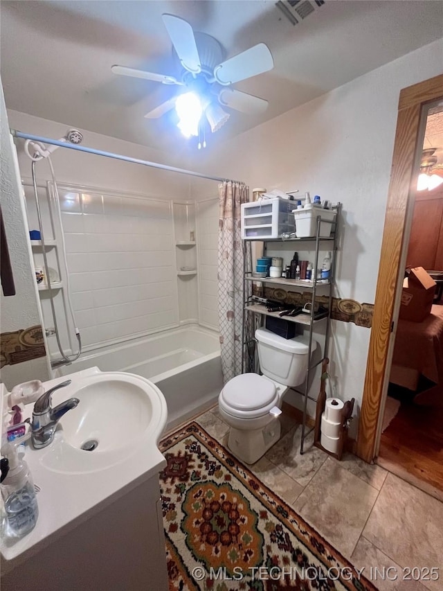 full bathroom with tile patterned flooring, toilet, visible vents, vanity, and shower / bath combination with curtain
