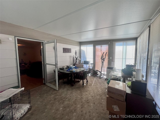 home office with carpet flooring