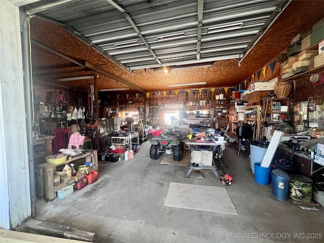 garage featuring a workshop area