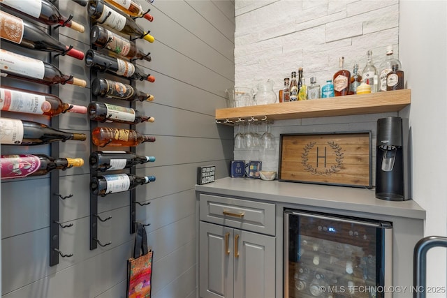 2715 E 136th St S, Bixby, OK 74008 - wine room featuring beverage cooler and a dry bar