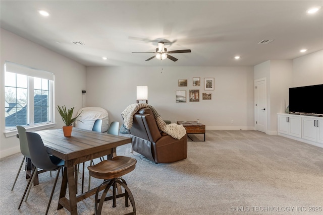 dining room with light carpet, baseboards, visible vents, a ceiling fan, and recessed lighting