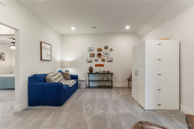 interior space featuring light carpet, visible vents, and recessed lighting