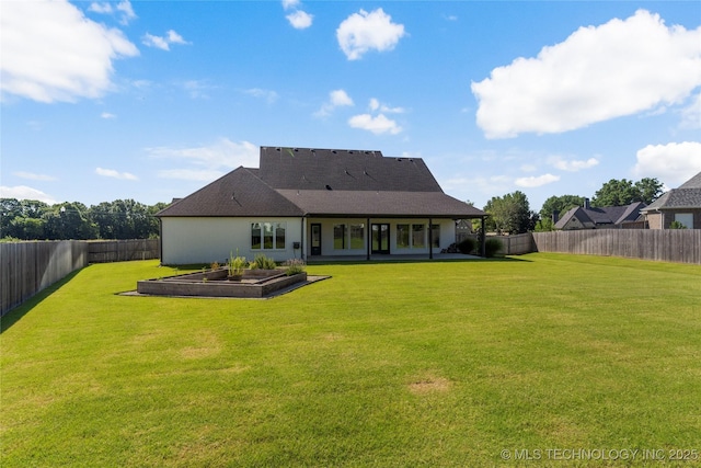 2715 E 136th St S, Bixby, OK 74008 - rear view of house with a fenced backyard and a garden