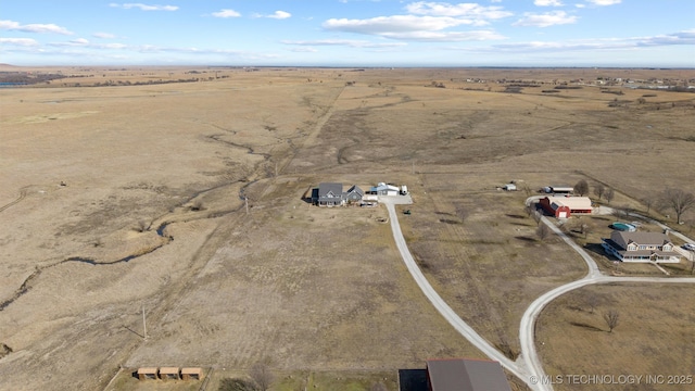 bird's eye view featuring a rural view and a desert view