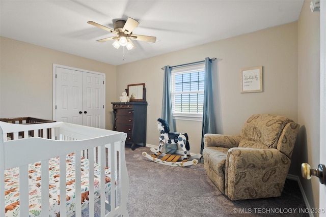 carpeted bedroom with a closet, a ceiling fan, and baseboards