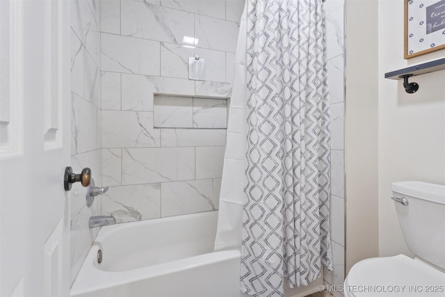 bathroom with toilet and shower / bath combo with shower curtain