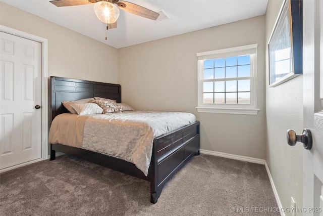 bedroom featuring a ceiling fan, carpet, and baseboards