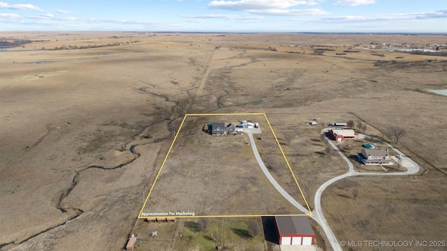 aerial view featuring a rural view and view of desert