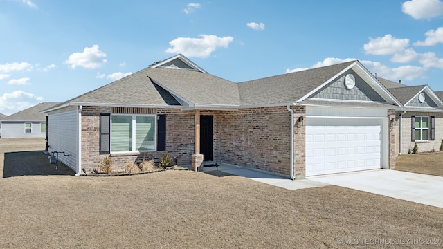 single story home featuring a shingled roof, concrete driveway, brick siding, and an attached garage