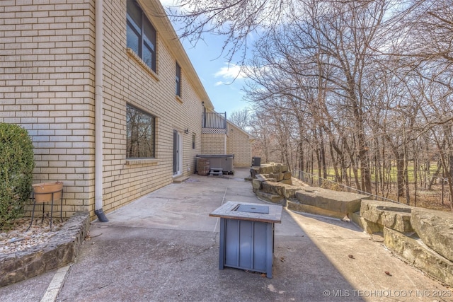 view of patio featuring a hot tub