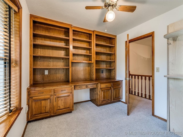 8934 S 41st W Ave, Tulsa, OK 74132 - unfurnished office featuring built in study area, a ceiling fan, and light colored carpet