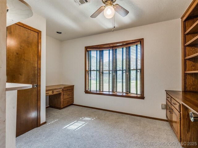 8934 S 41st W Ave, Tulsa, OK 74132 - unfurnished bedroom with light carpet, a desk, and ceiling fan
