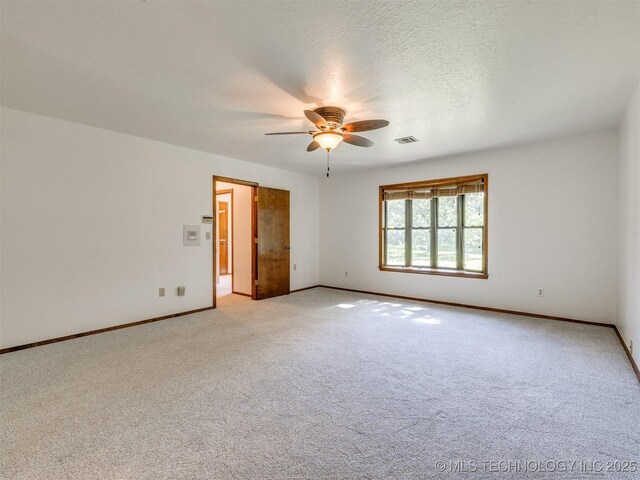 8934 S 41st W Ave, Tulsa, OK 74132 - empty room with ceiling fan and light carpet