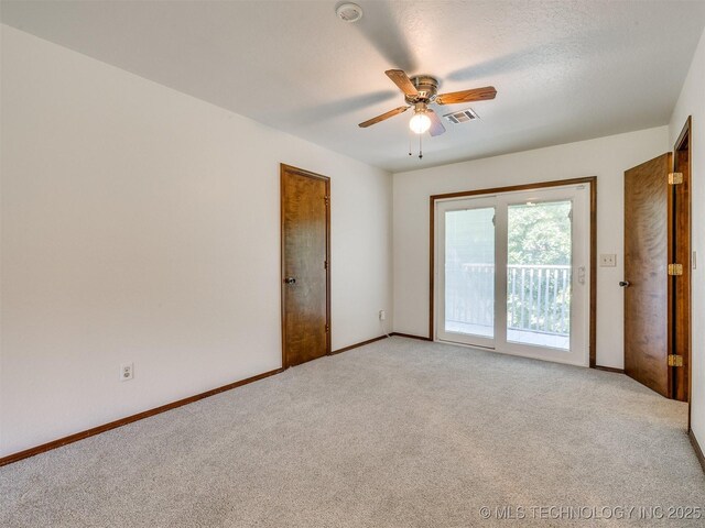 8934 S 41st W Ave, Tulsa, OK 74132 - empty room with light carpet, a ceiling fan, and a smoke detector
