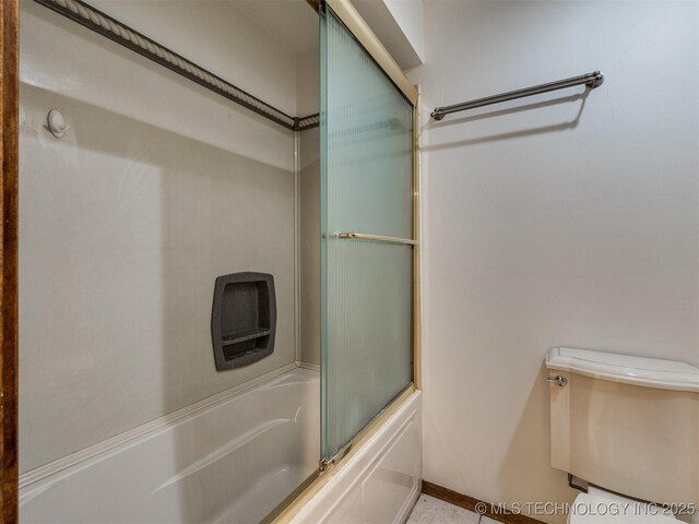8934 S 41st W Ave, Tulsa, OK 74132 - bathroom with toilet and bath / shower combo with glass door