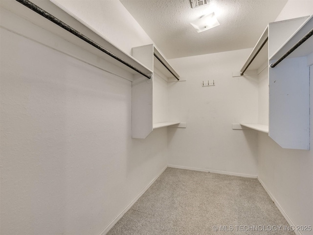 8934 S 41st W Ave, Tulsa, OK 74132 - spacious closet featuring carpet floors