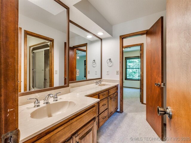 8934 S 41st W Ave, Tulsa, OK 74132 - full bathroom featuring double vanity and recessed lighting