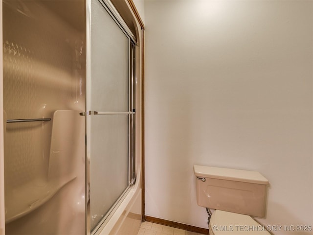 8934 S 41st W Ave, Tulsa, OK 74132 - bathroom featuring a shower with shower door and tile patterned floors