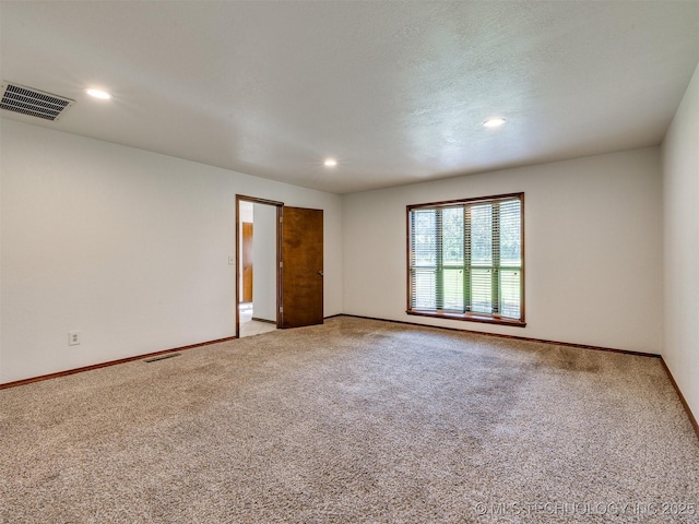 8934 S 41st W Ave, Tulsa, OK 74132 - unfurnished room with light colored carpet and recessed lighting