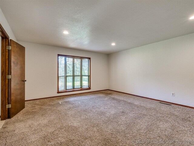 8934 S 41st W Ave, Tulsa, OK 74132 - carpeted spare room with recessed lighting
