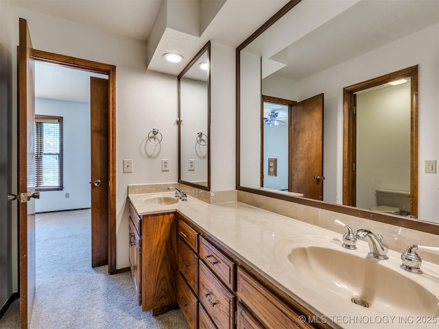8934 S 41st W Ave, Tulsa, OK 74132 - bathroom with double vanity and toilet
