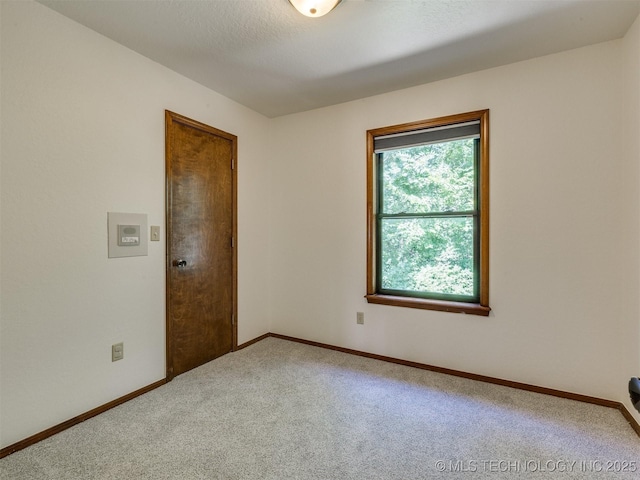 8934 S 41st W Ave, Tulsa, OK 74132 - carpeted empty room with baseboards