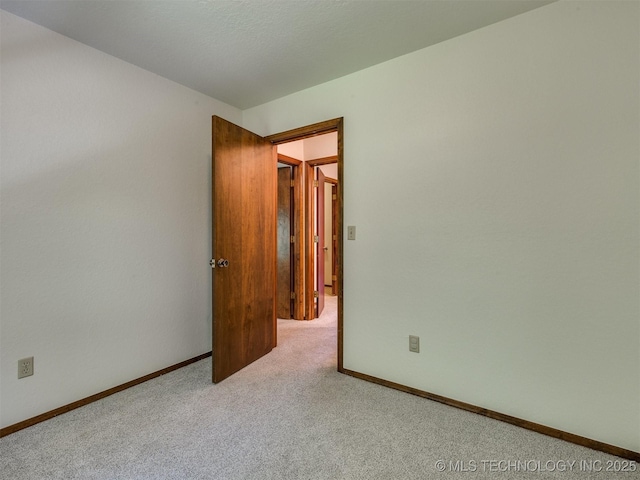 8934 S 41st W Ave, Tulsa, OK 74132 - unfurnished room featuring carpet flooring and baseboards