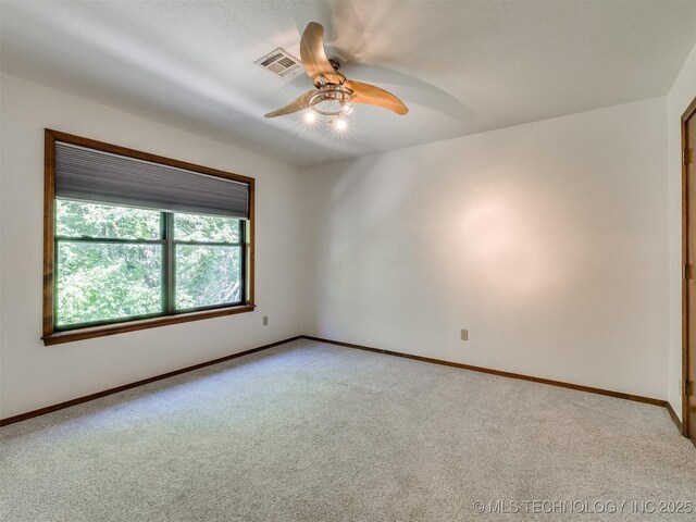 8934 S 41st W Ave, Tulsa, OK 74132 - unfurnished room with a ceiling fan and light colored carpet