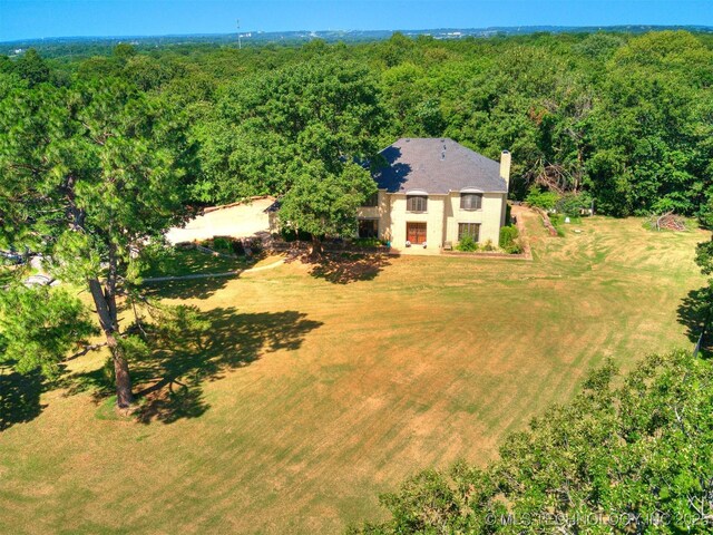 8934 S 41st W Ave, Tulsa, OK 74132 - view from above of property with a forest