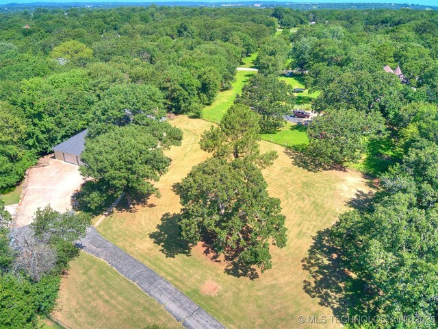 8934 S 41st W Ave, Tulsa, OK 74132 - view of property location with a heavily wooded area