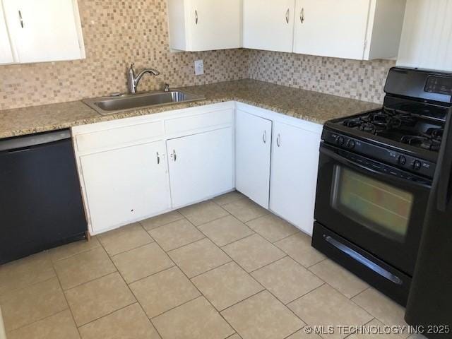 kitchen with dishwashing machine, tasteful backsplash, black range with gas stovetop, and a sink