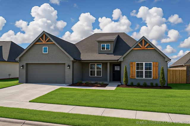 craftsman-style home with fence, concrete driveway, a garage, and a front yard