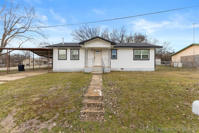 view of front of house with concrete driveway, crawl space, fence, a front lawn, and a carport