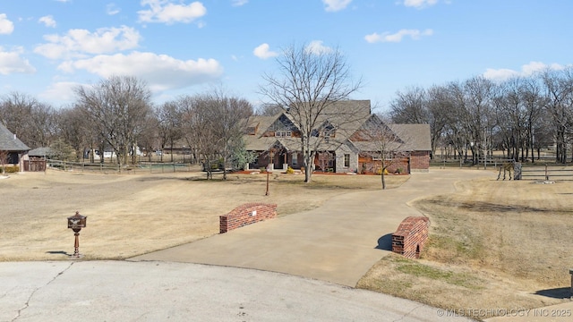 exterior space with concrete driveway