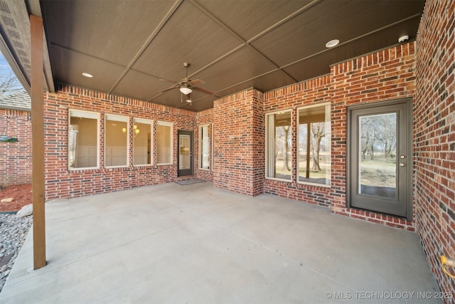 view of patio featuring a ceiling fan