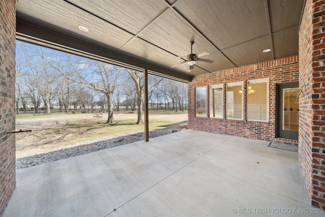 view of patio featuring a ceiling fan