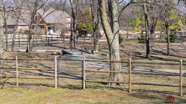 view of yard with a gate and fence