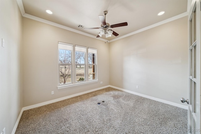 carpeted spare room featuring baseboards, visible vents, ceiling fan, ornamental molding, and recessed lighting