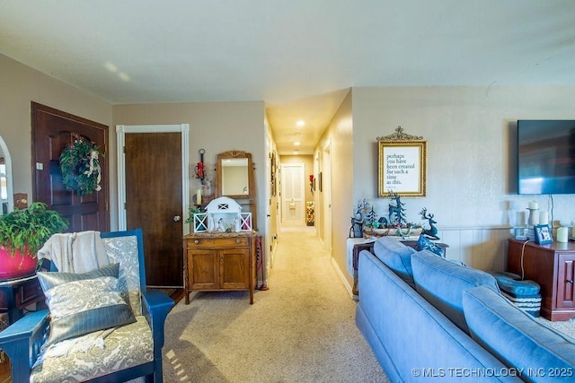 living room with light colored carpet