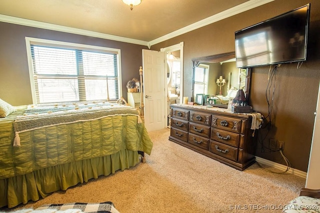 carpeted bedroom featuring ornamental molding and baseboards