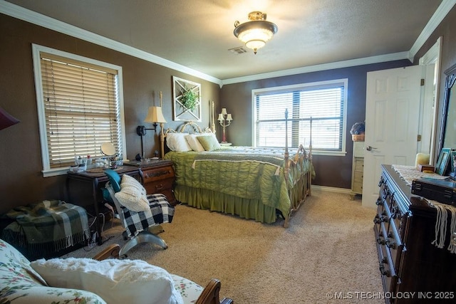 carpeted bedroom featuring visible vents, crown molding, and baseboards