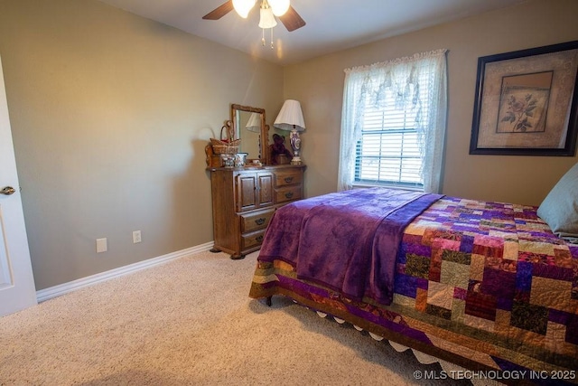 bedroom featuring carpet, baseboards, and ceiling fan